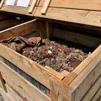 A wood compost bin