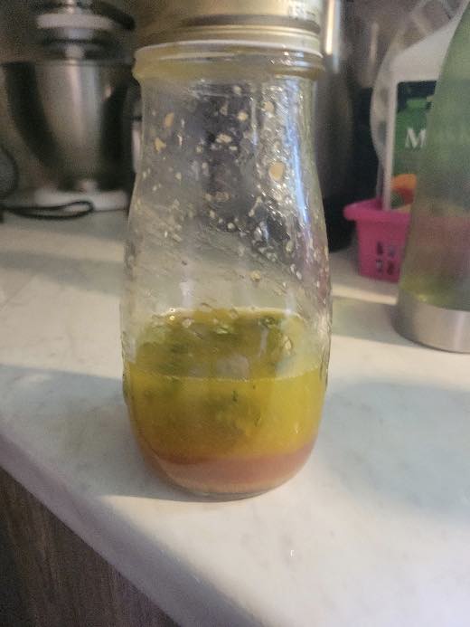 Shaken Nasturtium Vinaigrette in a jar