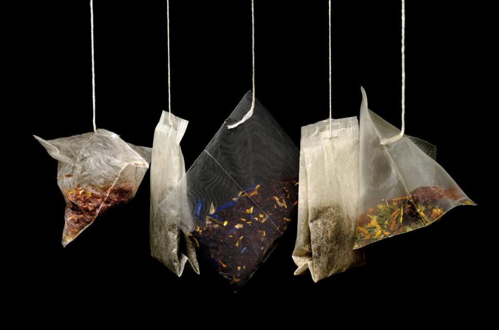 Herbs hanging in kitchen to dry