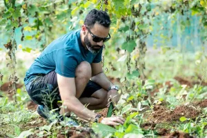 Man gardening with sun glasses for eye care