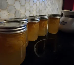 Homemade jam in five mason jars
